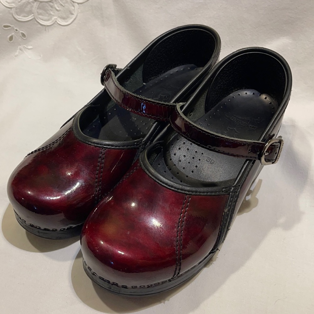 Dansko Leather Clogs. Mary Jane style with buckle.